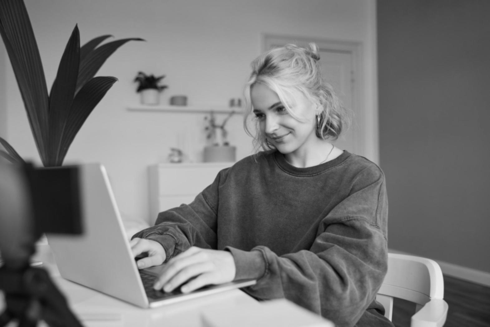 Software development workspace with multiple monitors showing financial data analysis